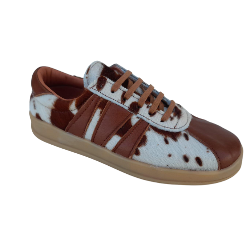 Championes en cuero con diseño Cow Print