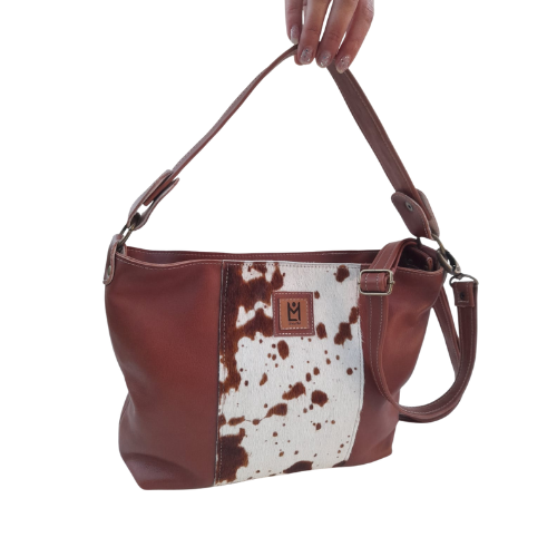 Cartera de cuero con diseño vaquita