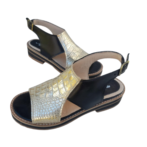 Sandalias de cuero negro con detalle reptil dorado